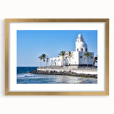 Extra large abstract art print featuring textured scenery of Saudi Arabia in gold tones, framed with mat.