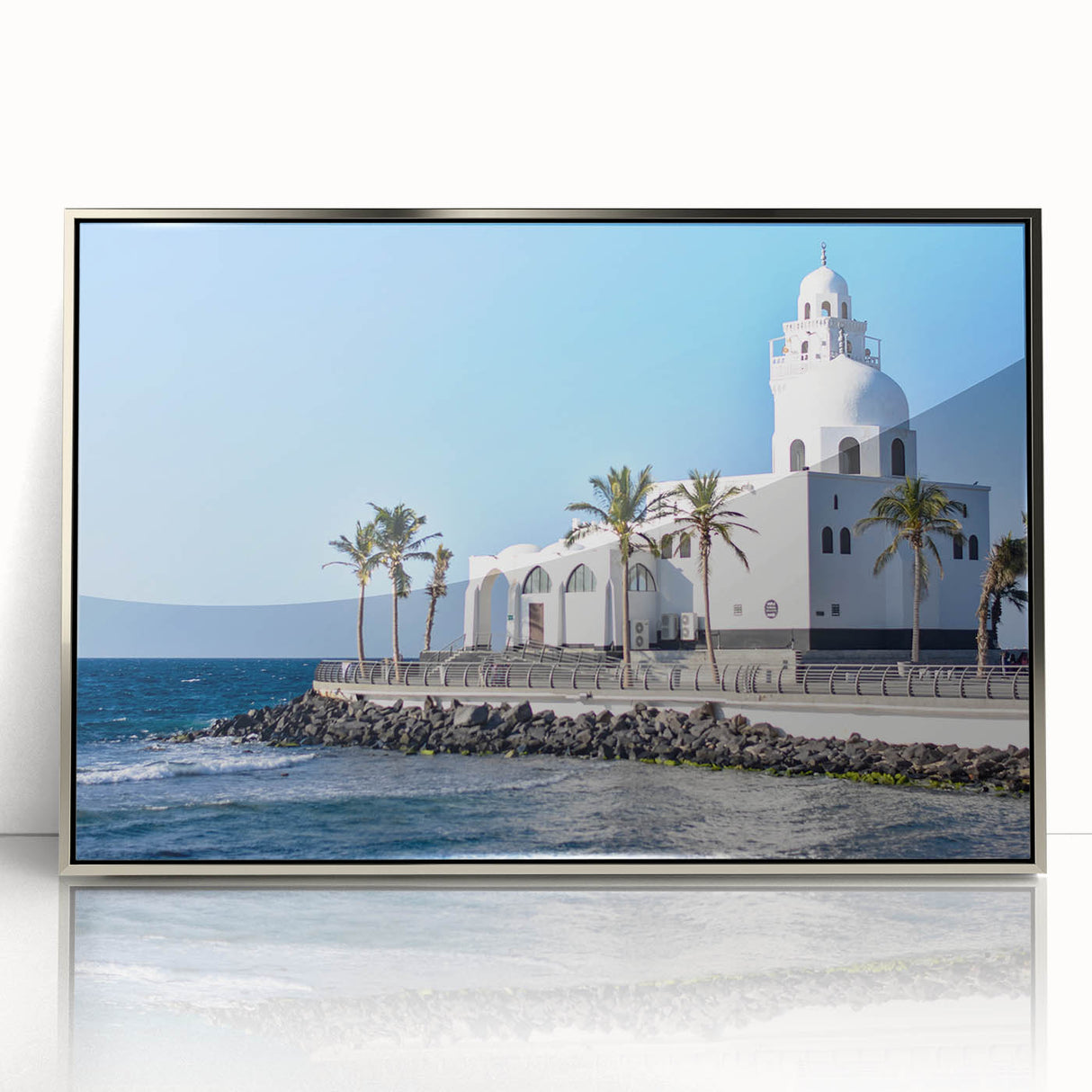 Mid-century modernist art depicting a serene Saudi Arabian landscape on a silver-framed acrylic print.