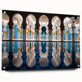 Large abstract wall art of Abu Dhabi skyline in muted gray and blue tones on acrylic glass.
