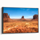 Black and white wall art of Monument Valley on a framed canvas, ideal for bedroom decor with a vintage poster style.