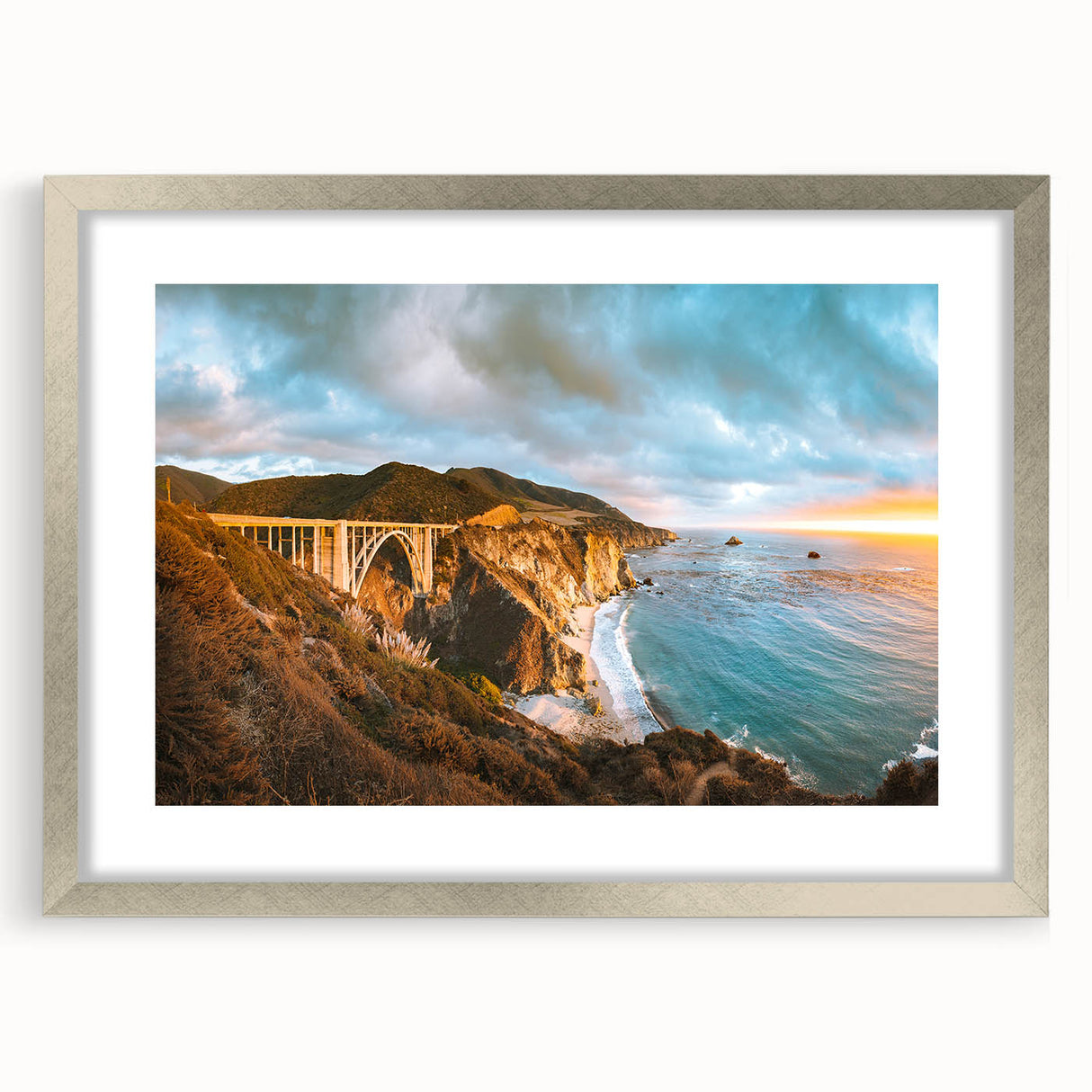 Textured art print of California's Big Sur in abstract style with silver frame, suited for bedroom decor.