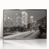 Mid-century modernist art of Los Angeles skyline in muted gray tones, silver-framed acrylic, suitable for nursery wall art.