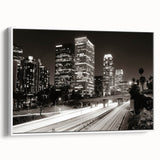 Vintage poster art of Los Angeles skyline, featuring vibrant colors on a large framed canvas, suitable for living room decor.