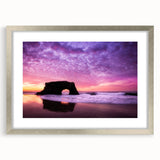 Textured abstract art print depicting the Santa Cruz coastline in muted blue and gray tones on a silver-framed canvas.