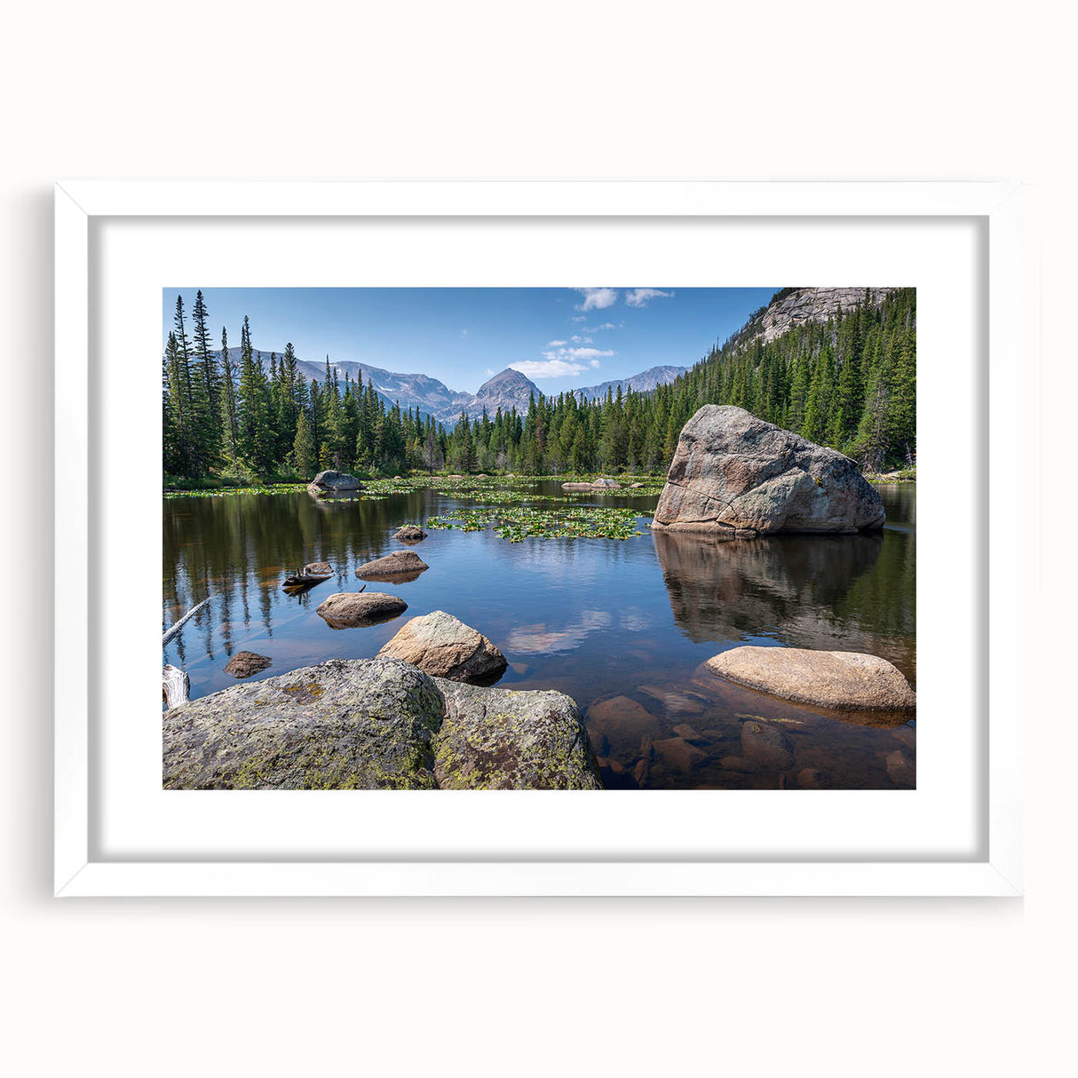 Abstract art print of Boulder, Colorado landscape in muted earth tones on a framed white mat, ideal for dining room decor.