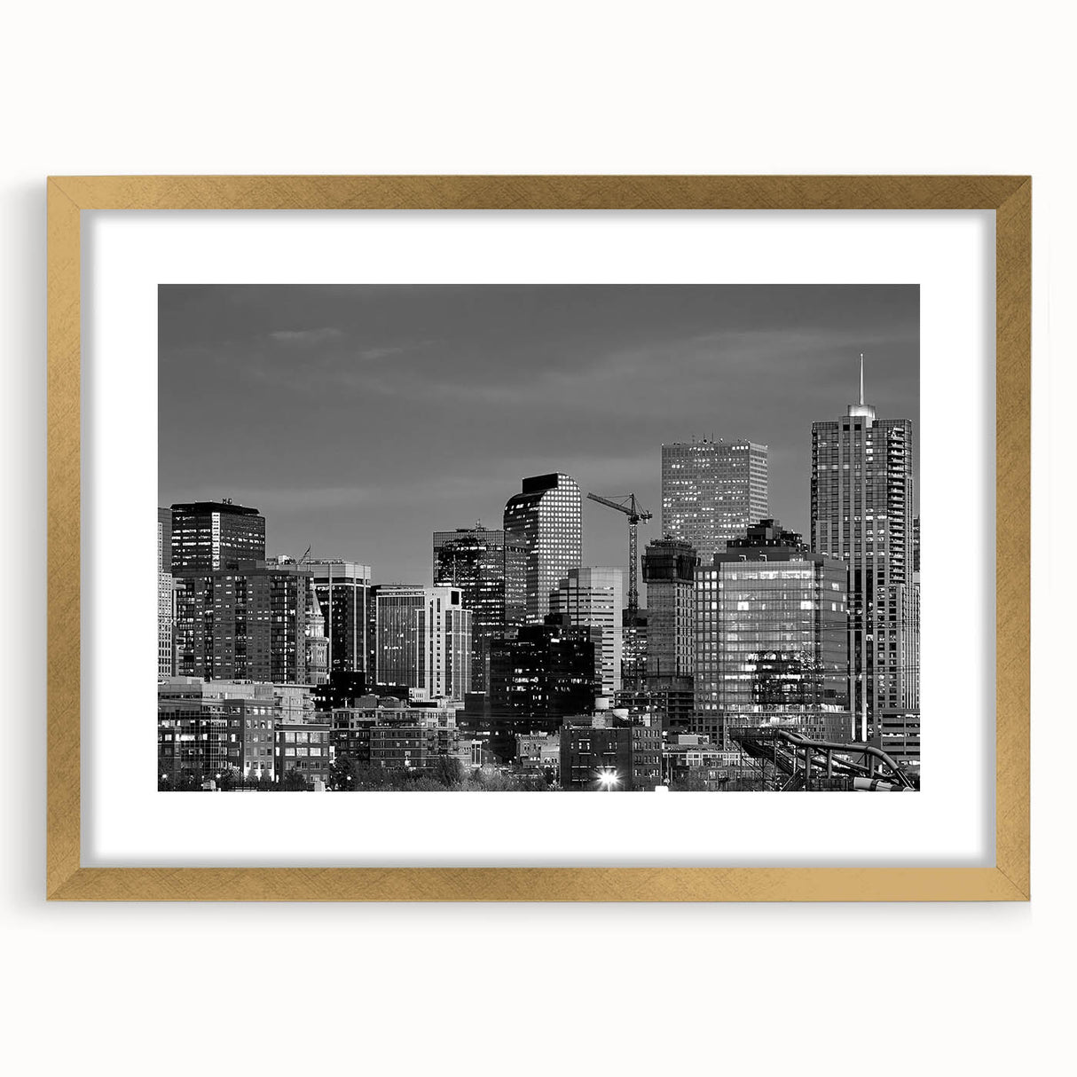 Extra large abstract art print of Denver scenery in textured shades of blue and gold, framed with a gold mat.