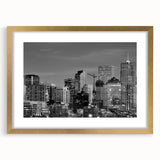Extra large abstract art print of Denver scenery in textured shades of blue and gold, framed with a gold mat.