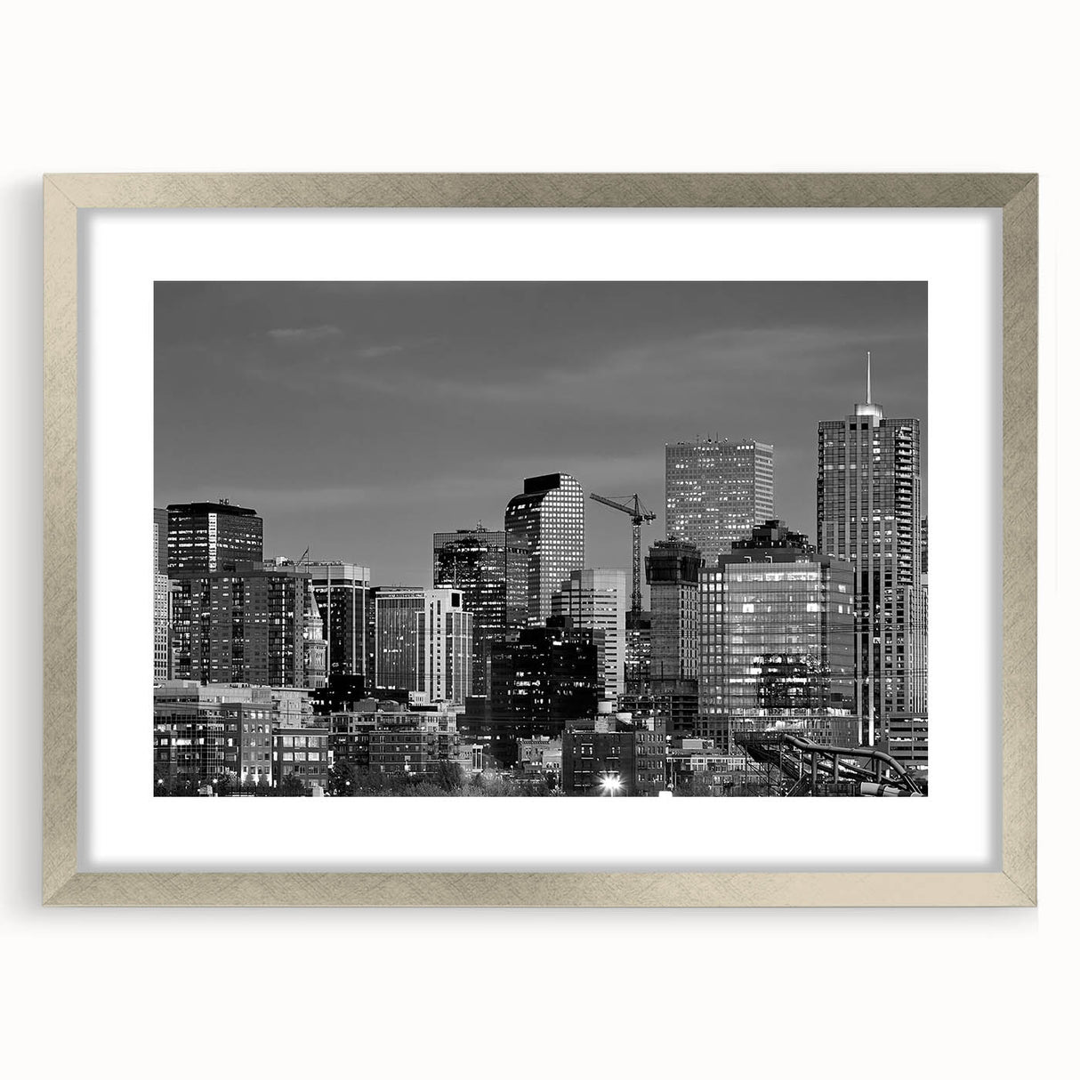 Textured abstract art print of Denver skyline in muted blue and gray, framed in silver, ideal for bedroom art.