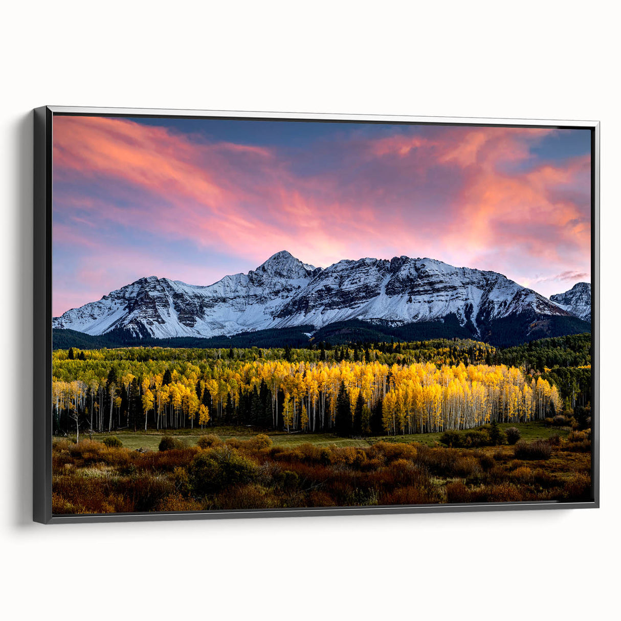 Black and white wall art featuring a vintage poster-style landscape of Telluride, Colorado on a framed canvas.