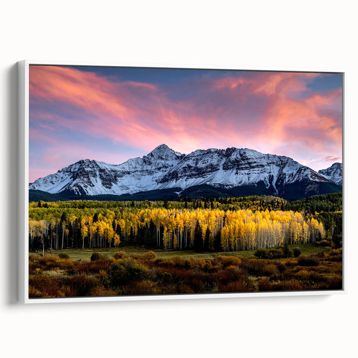 Vintage poster art of Telluride, Colorado with colorful mountain scenery on a white framed canvas.