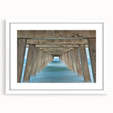 Abstract art print of Savannah, Georgia, featuring muted earth tones on a framed white mat, suitable for dining room decor.