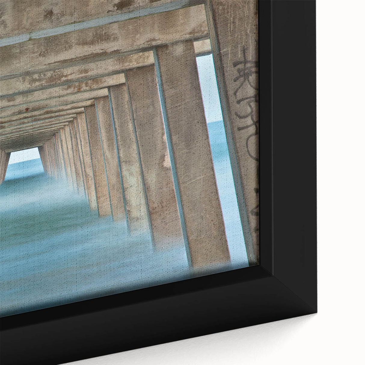 Close-up of black wall art featuring a textured Savannah, USA scenery in vibrant colors on a framed canvas.