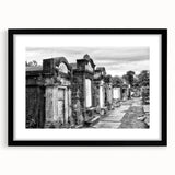 Abstract art print featuring vibrant, colorful depiction of New Orleans, framed in black, ideal for living room decor.