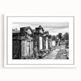 Abstract art print of New Orleans cityscape in muted gray and blue tones, framed with a white mat.