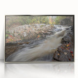 Mid-century modernist art depicting Acadia, Maine scenery in muted earth tones on a silver-framed acrylic print.