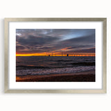 Textured abstract art print of Annapolis scenery in muted gray tones, framed in silver, ideal for bedroom decor.
