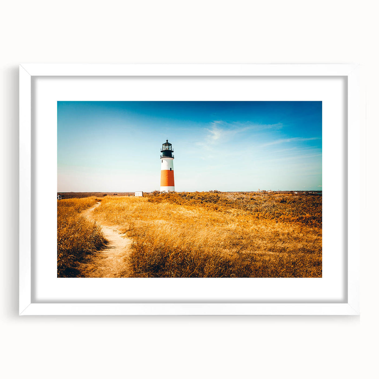 Abstract art print of Massachusetts' Nantucket coastline in muted blue and gray tones, framed in white.