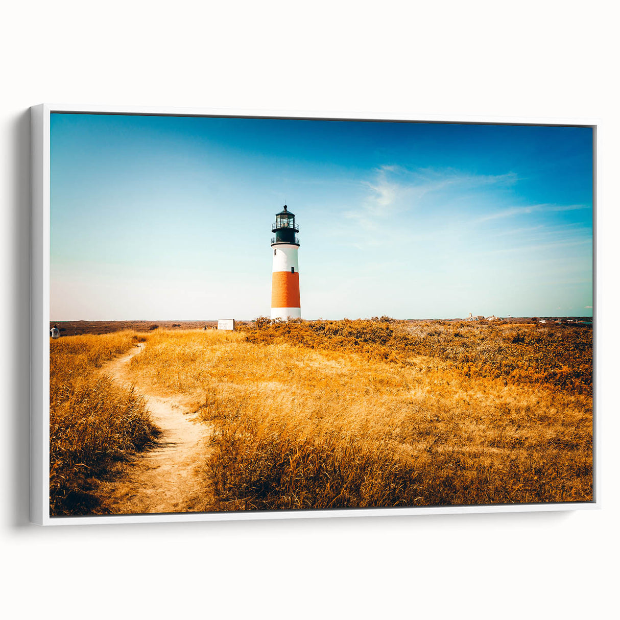 A vintage poster art of Nantucket with colorful accents on a large framed canvas, ideal for living room decor.