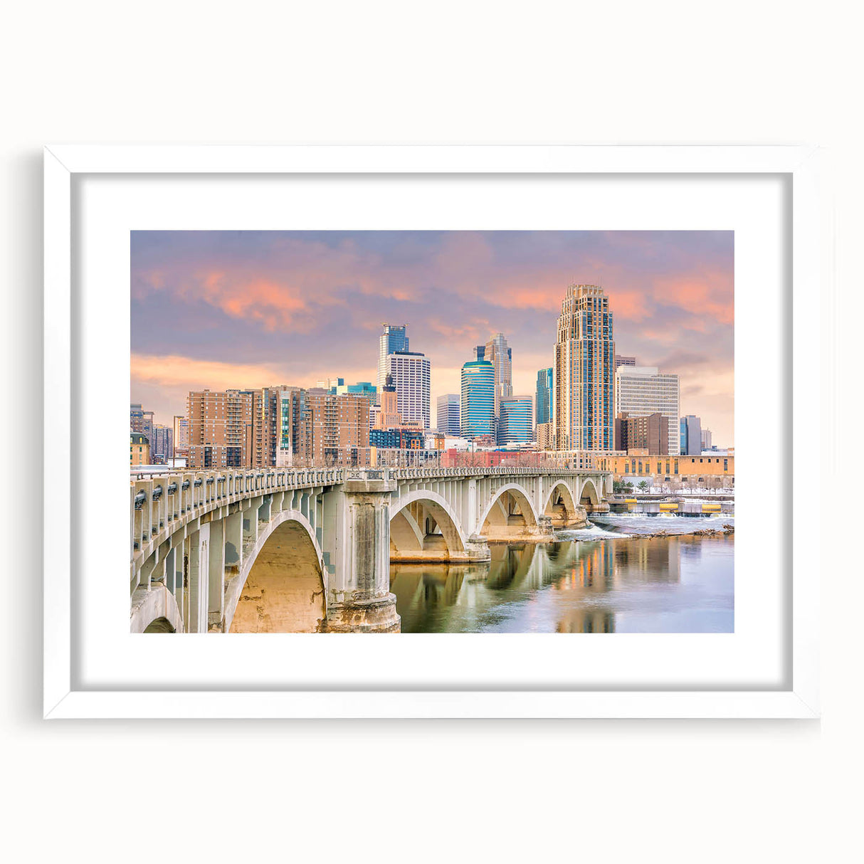 Abstract art print of Minneapolis skyline in muted blue and gray tones on a framed white mat, ideal for dining room decor.