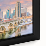 Extra large framed canvas featuring a textured depiction of Minneapolis skyline in black with colorful accents.