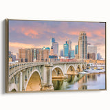 Framed canvas of Minneapolis landscape in muted gold and black tones, ideal for bedroom wall art.