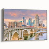 Framed canvas of a vintage Minneapolis landscape painting in colorful hues, ideal for living room decor.