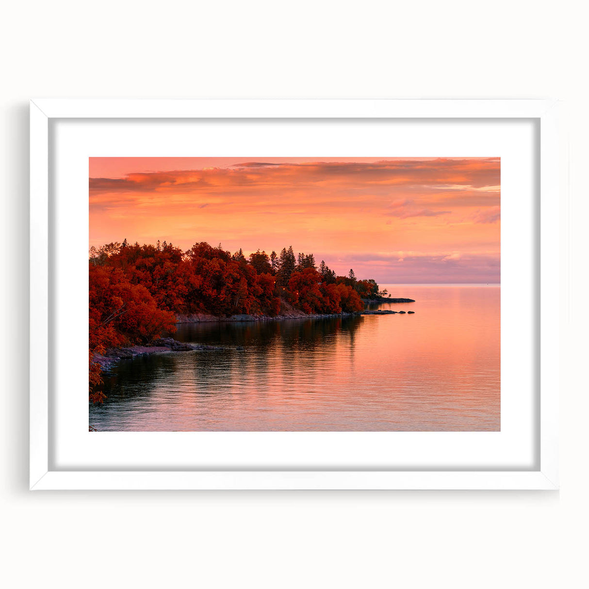 Abstract art print of a Minnesota landscape in muted blue and green tones, framed in white, suitable for dining room decor.