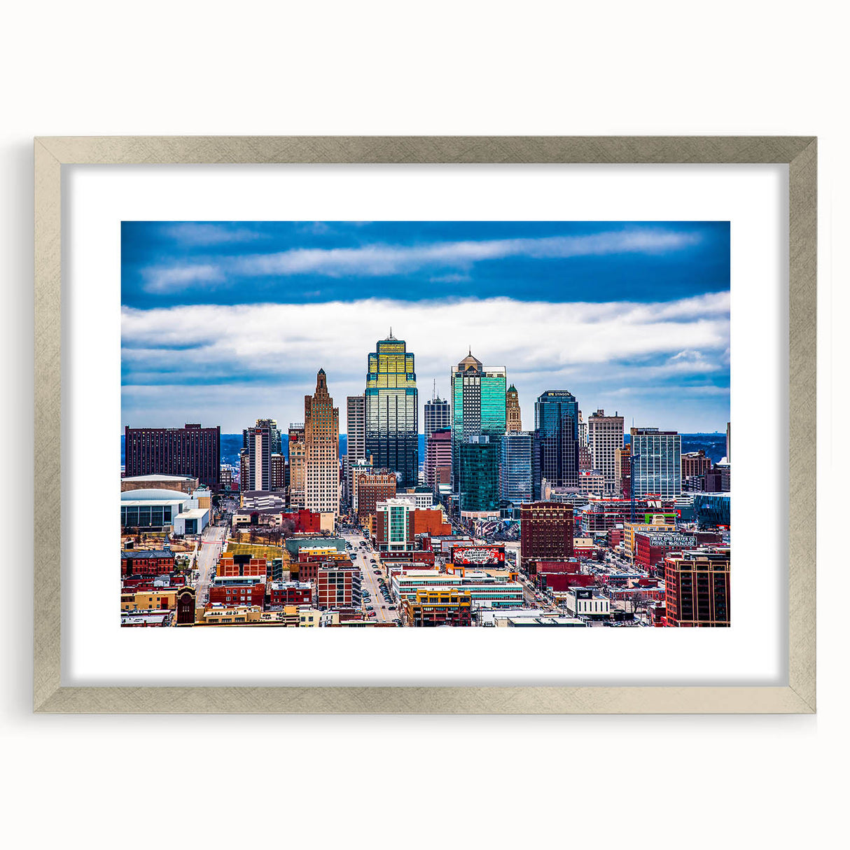 Textured abstract art print of Kansas City skyline in muted gray tones on framed silver mat, ideal for bedroom art.