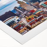 Art deco poster of Kansas City skyline in muted gold and blue tones on rolled canvas, suitable for dining room decor.