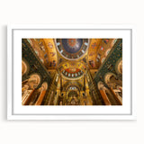 Abstract art print of the St. Louis skyline in muted blues and grays, framed in white, ideal for dining room decor.