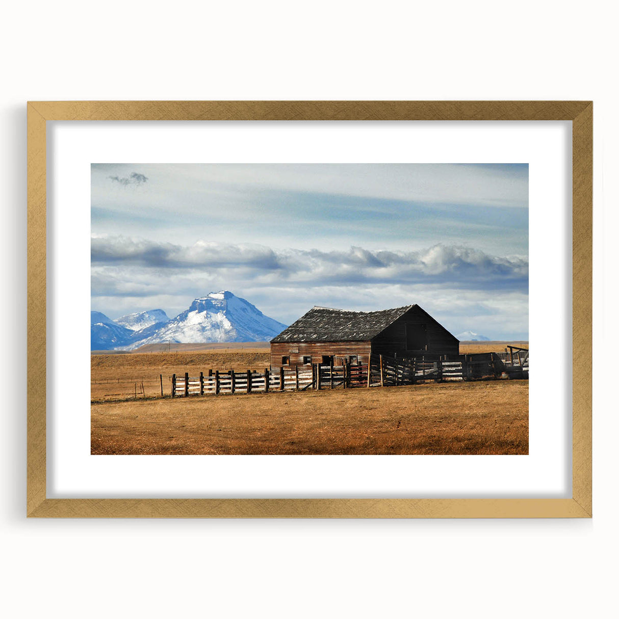 Extra large wall art of abstract Montana scenery in textured gold frame, ideal for living room ambiance.
