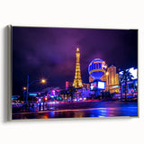 Framed canvas landscape art painting depicting a colorful Las Vegas scene in vintage poster style.