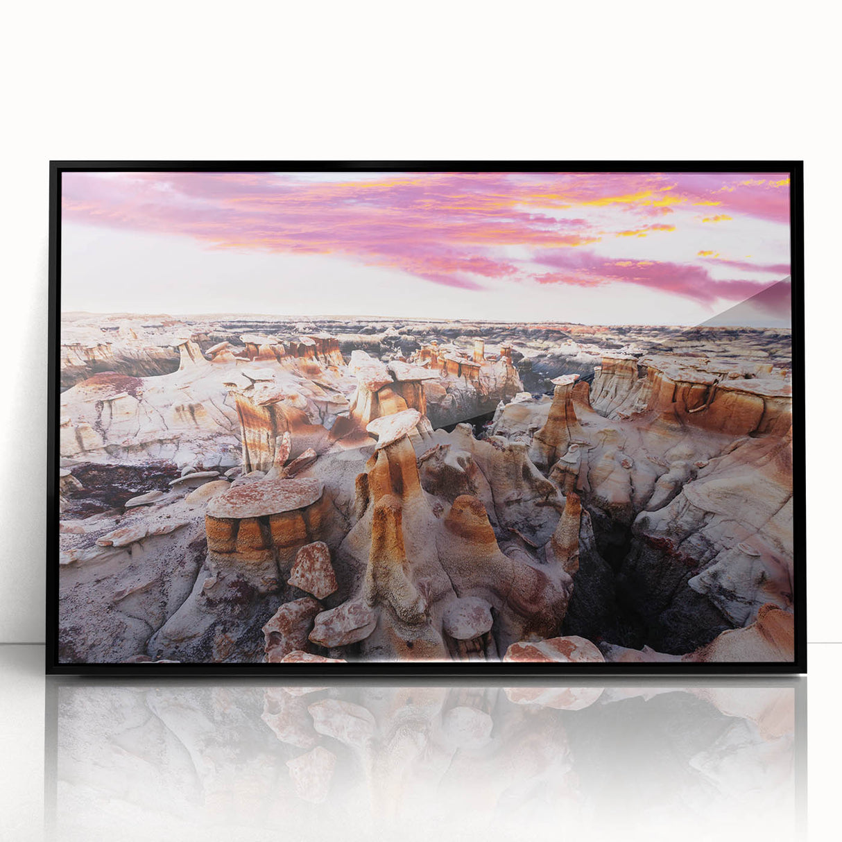 Large abstract wall art depicting a New Mexico landscape in muted earth tones, framed in black acrylic.