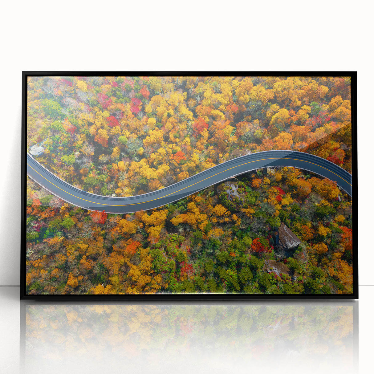 Large abstract wall art of Blue Ridge, North Carolina in muted blue and green tones on a framed acrylic.