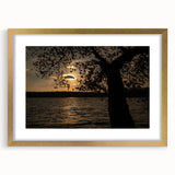 Extra large abstract art print of Raleigh, featuring textured strokes in earthy tones, framed in gold.