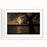 Abstract art print of Raleigh skyline in muted blue tones on a white framed canvas, ideal for dining room decor.
