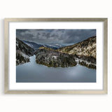 Textured art print of abstract Adirondacks scenery in silver frame, using muted earth tones, ideal for bedroom decor.