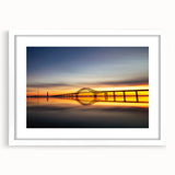 Abstract art print of Long Island scenery in muted blue and green tones, framed with a white mat.