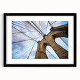 Abstract art print of the Brooklyn Bridge in colorful, textured style on a large framed canvas.