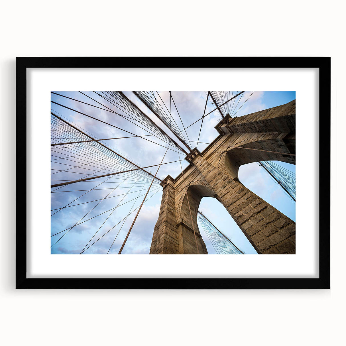 Abstract art print of the Brooklyn Bridge in colorful, textured style on a large framed canvas.