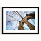 Abstract art print of the Brooklyn Bridge in colorful, textured style on a large framed canvas.