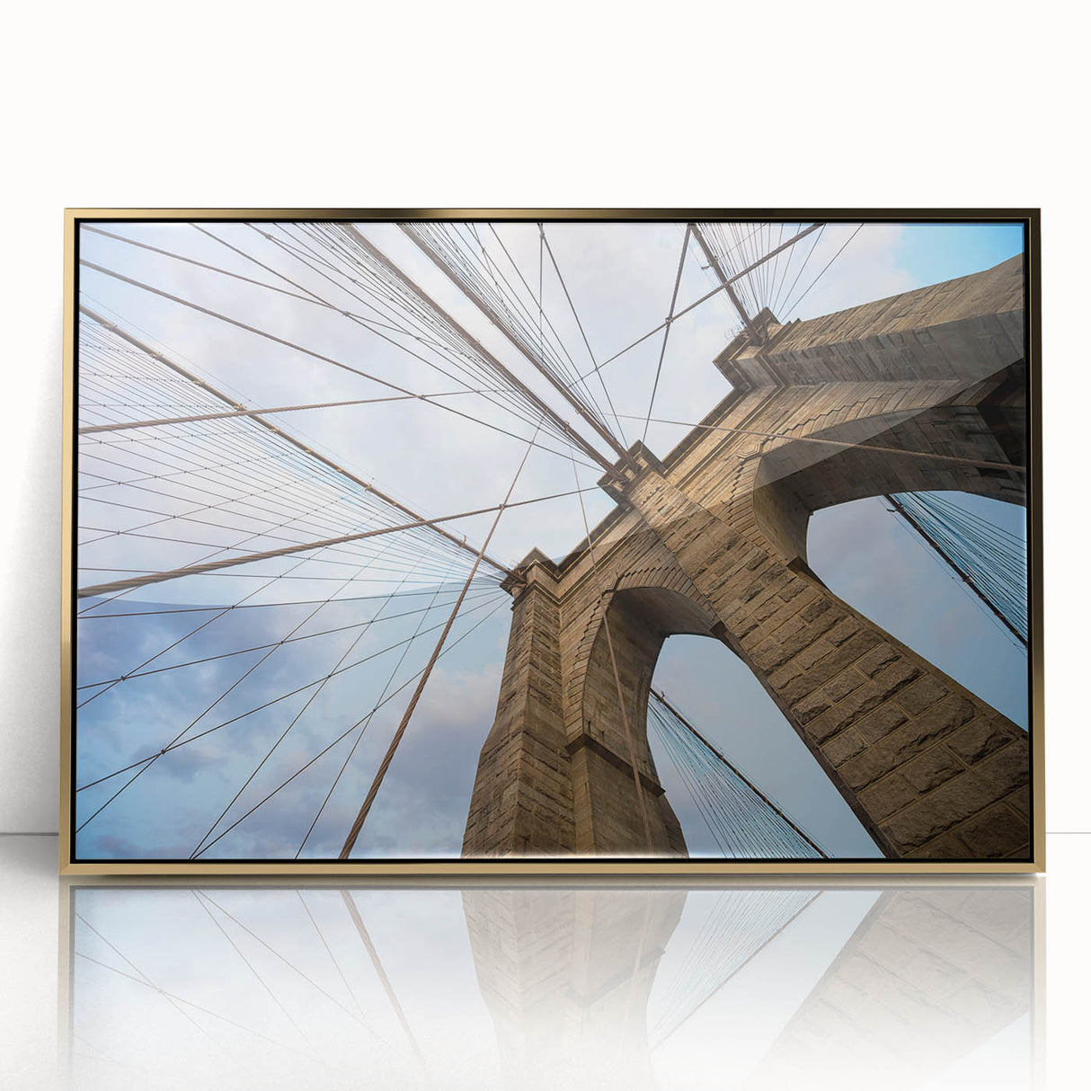 Acrylic print of Brooklyn Bridge in muted gray and gold tones, framed, mid-century modernist style.