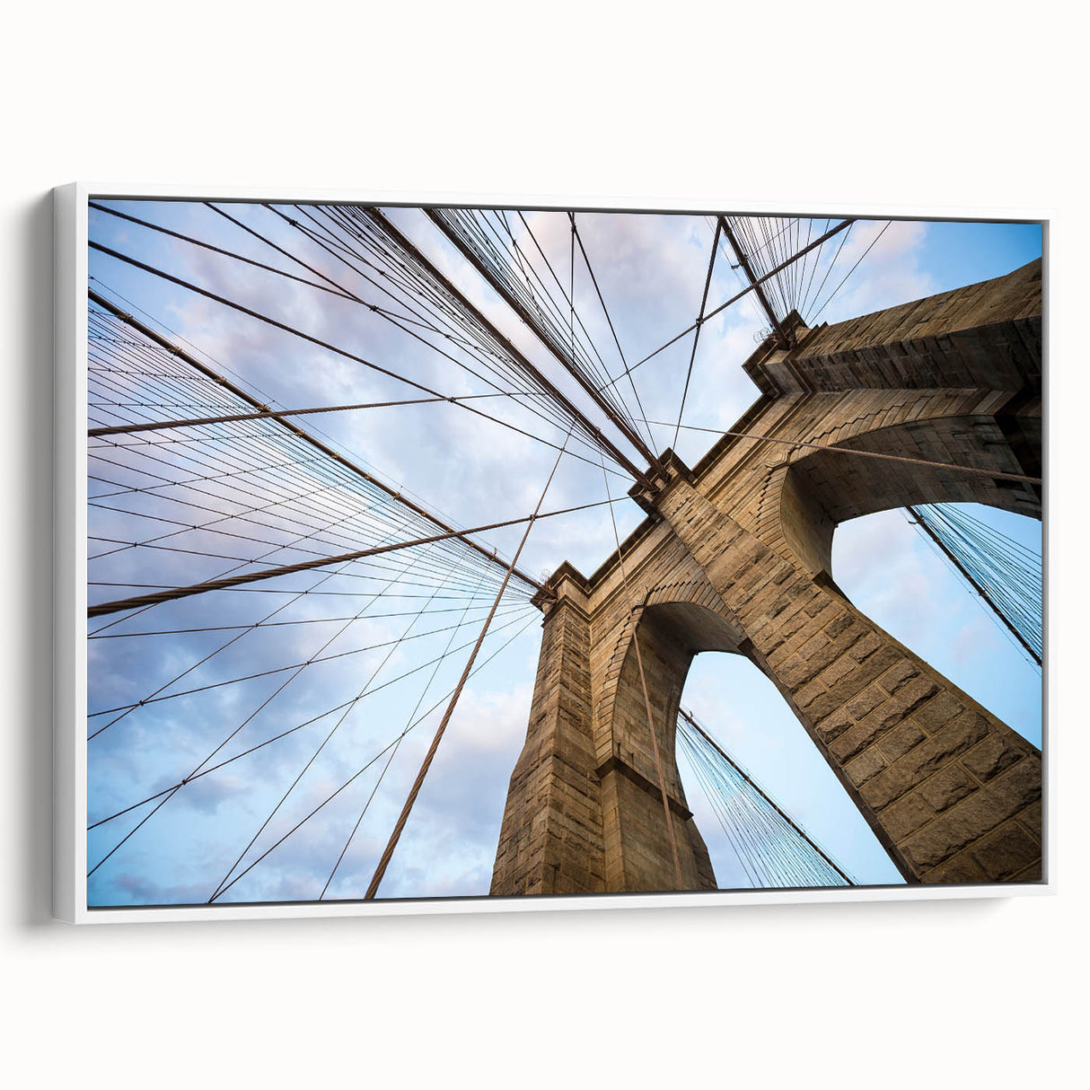 Vintage poster art of the Brooklyn Bridge in black and white on a framed canvas, ideal for living room decor.