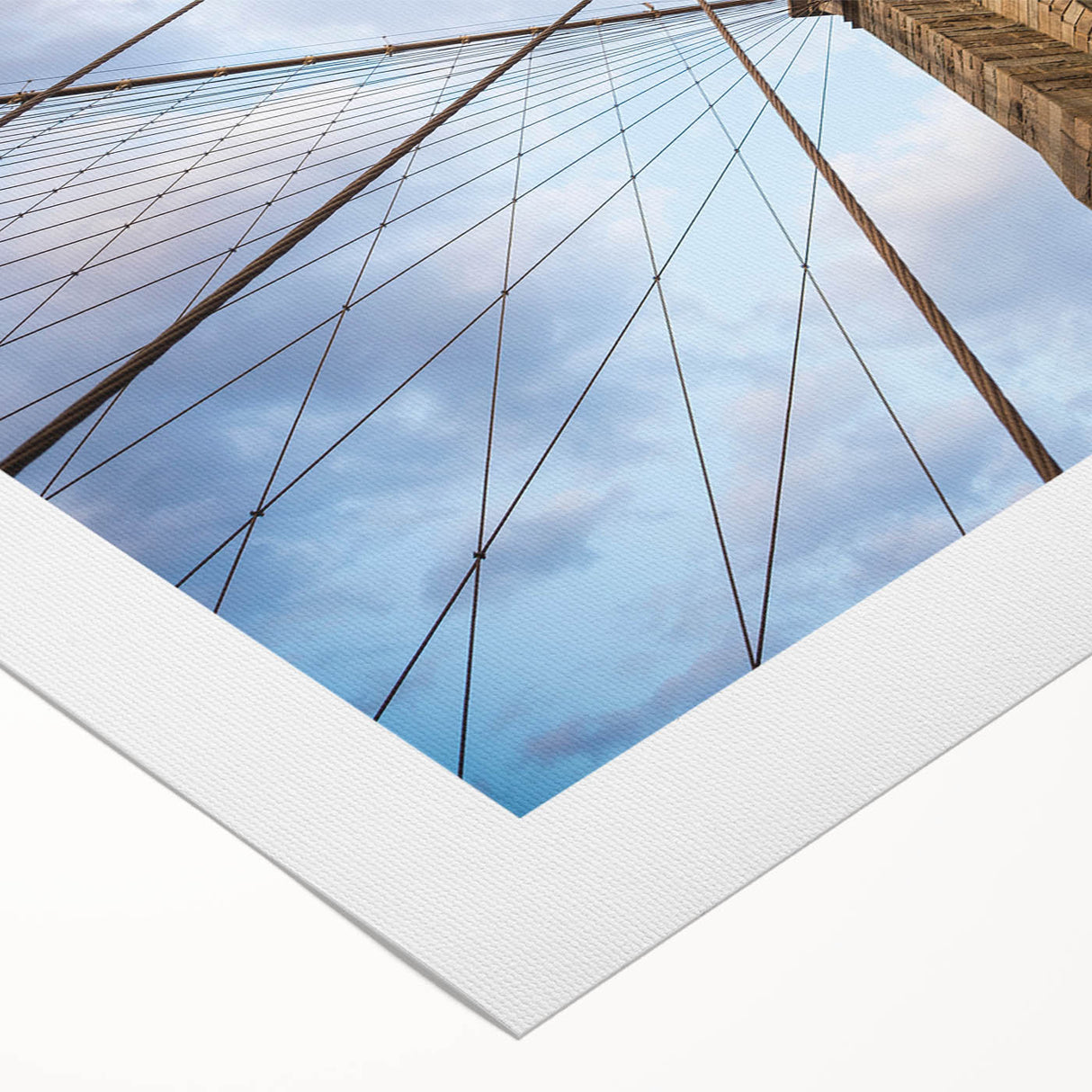 Art deco poster of the Brooklyn Bridge in grayscale tones on a rolled canvas, suited for dining room wall art.