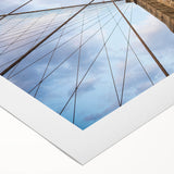 Art deco poster of the Brooklyn Bridge in grayscale tones on a rolled canvas, suited for dining room wall art.