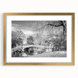 Extra large framed wall art depicting an abstract Central Park scene in textured gold and green tones.