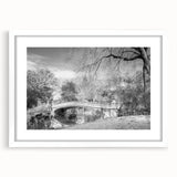 Abstract art print of Central Park in muted green and brown tones on a white framed canvas.