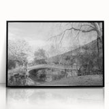 Large abstract wall art of Central Park in muted green and brown tones, framed in black acrylic.
