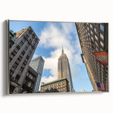 Landscape art painting of the NYC skyline on a framed canvas, featuring black and colorful vintage poster art.