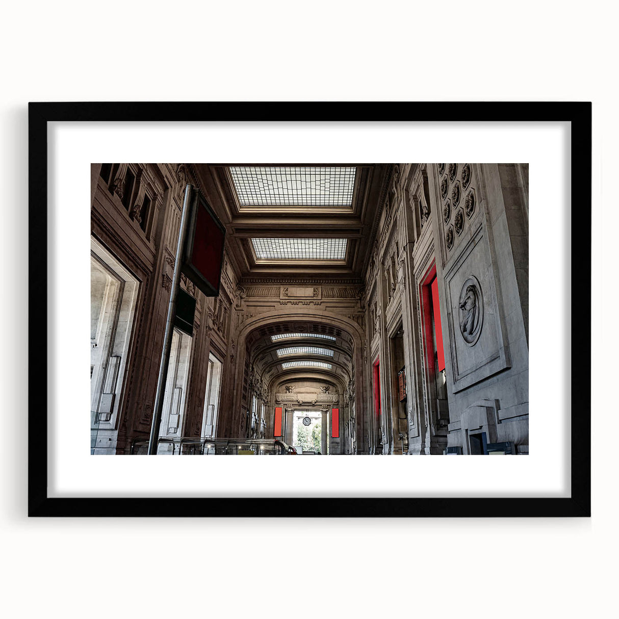 Colorful abstract art print of New York City's Grand Central, in a black frame, ideal for living room decor.